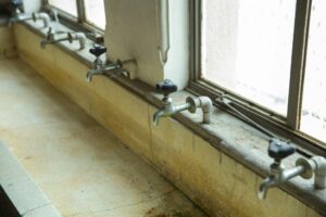 Mold and dirt in a bathroom - Indoor Air Quality Hacks for Allergy-Sensitive Households - Quality Home Products of Texas